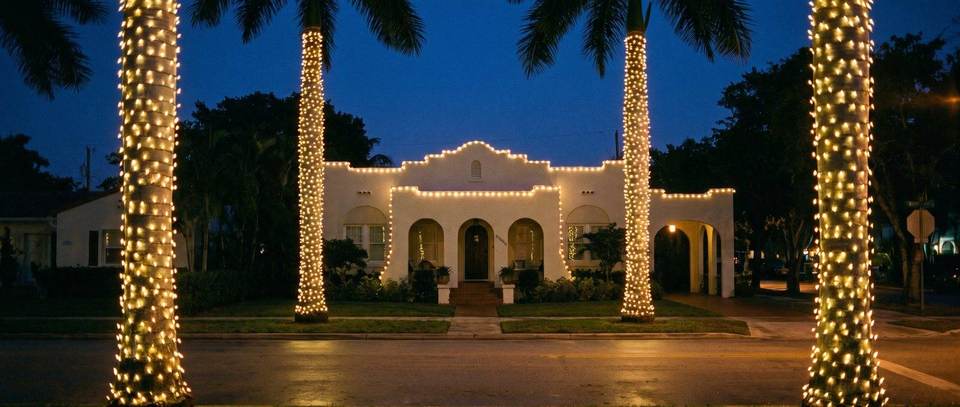 Mission-style home, Upper East Side, Miami: warm white Christmas lighting idea for Miami, FL from Mr. Christmas Lights, (786) 228-6649